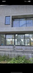 کرتین وال چیست ؟ بررسی کامل سیستم نمای شیشهای مدرن ساختمان